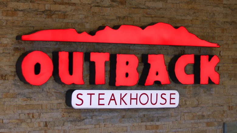 An Outback Steakhouse restaurant sign