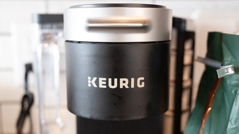 Close-up of a black Keurig coffee brewing machine