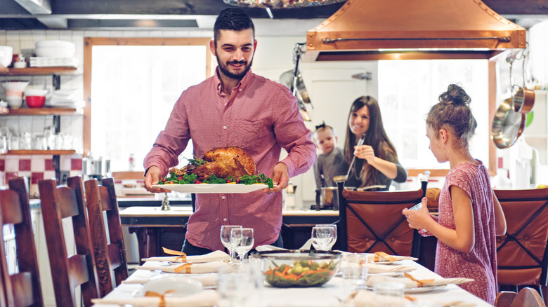 family working together on Thanksgiving