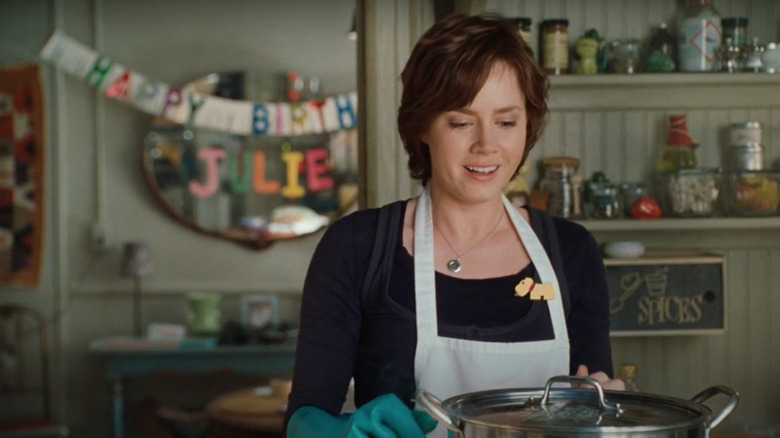 Amy Adams in Julie & Julia standing in front of a pot