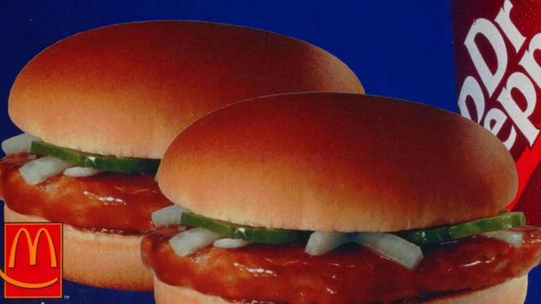 An extreme close-up of two McDonald's McRib Jr burgers