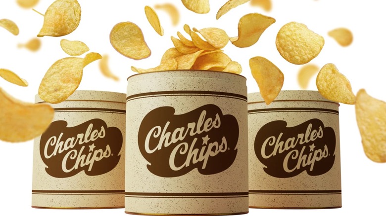 Three tins of Charles Chips