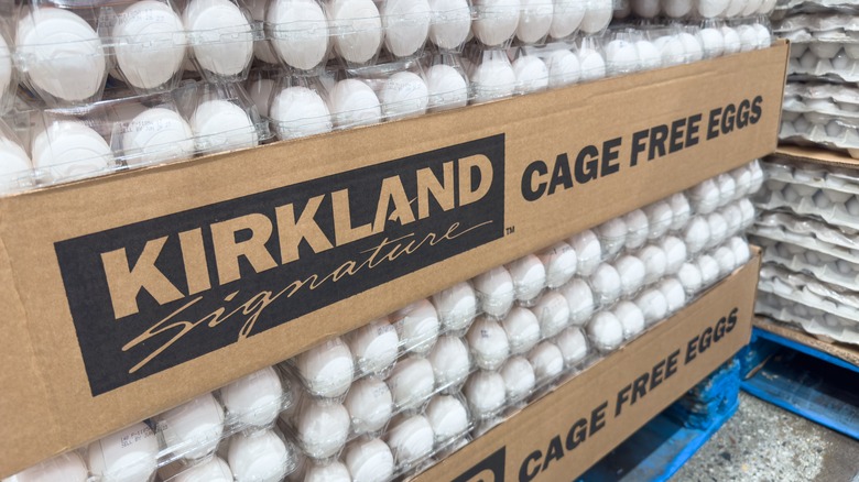 Stacks of Kirkland Signature cage free eggs in a Costco store