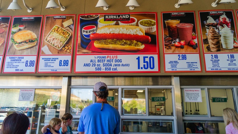 A Costco food court advertising the $1.50 hot-dog-and-soda combo