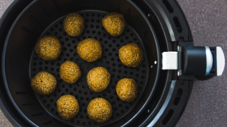 Canned chickpea falafel balls in air fryer basket