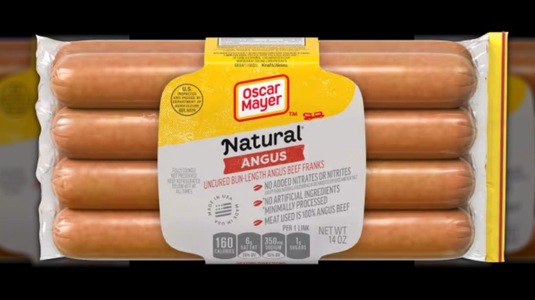 A pack of Oscar Mayer Angus Beef Franks on a black background