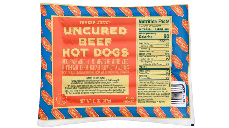 A pack of Trader Joe's Uncured Beef Hot Dogs on a white background