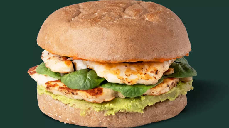 Starbucks Halloumi and Avocado Muffin on green background
