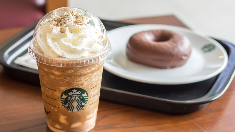 Starbucks Frappuccino with donut on plate