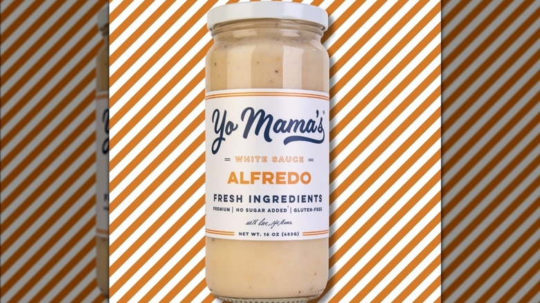 A jar of Yo Mama's Alfredo white sauce