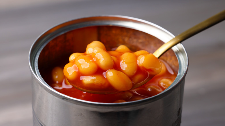 Baked beans with a spoon from a can