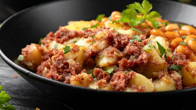Corned beef hash with potatoes and beans