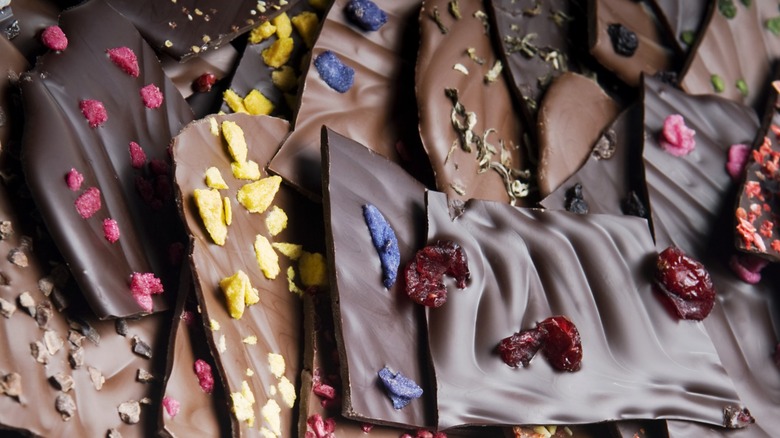 A close up of chocolate bars with added ingredients