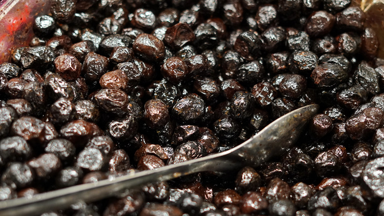 Bulk Nyons olives at market