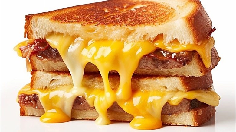 Close up of a grilled cheese sandwich with melting American cheese