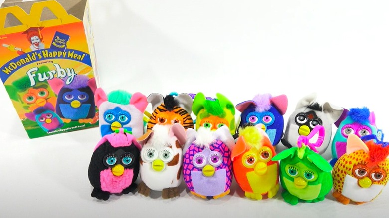 A McDonald's Happy Meal Furby box and 12 Furbys