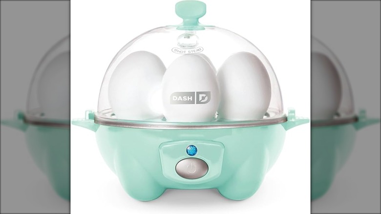 seafoam green egg cooker with 6 eggs