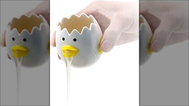 chicken shaped egg separator with hand
