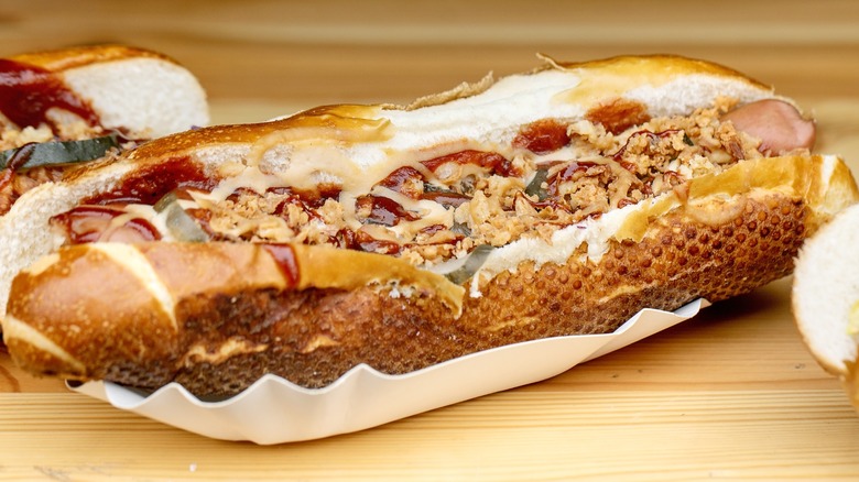 A hot dog served in a French baguette
