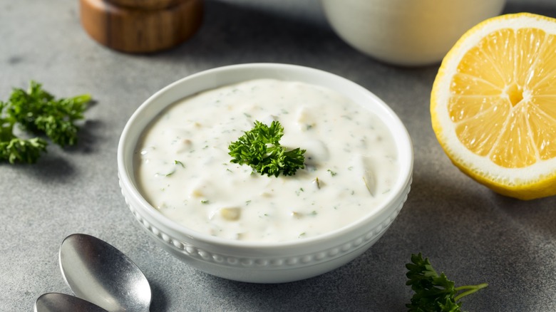 tartar sauce in small dish with lemon