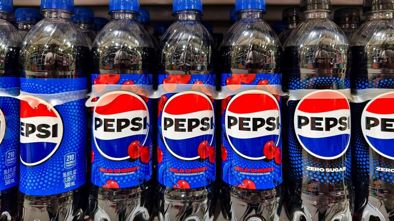 bottles of wild cherry pepsi on supermarket shelf