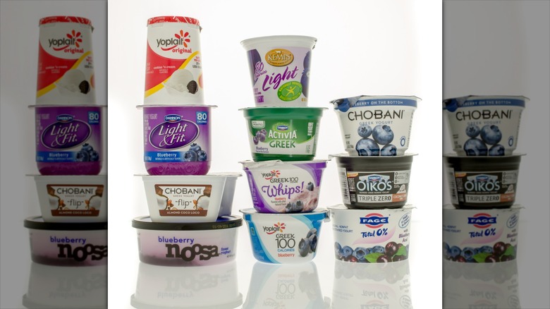 stacked containers of flavored yogurts