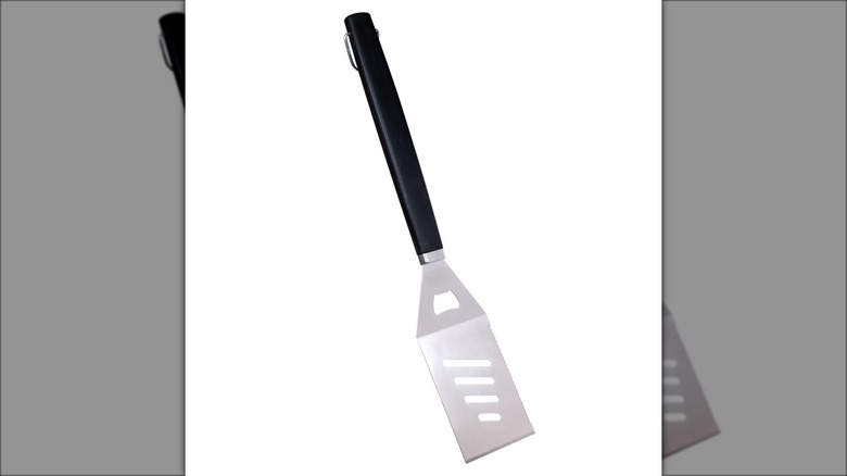 slotted bbq spatula white background