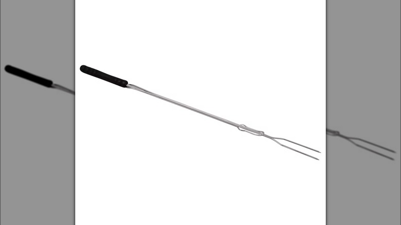 telescopic bbq fork white backrground