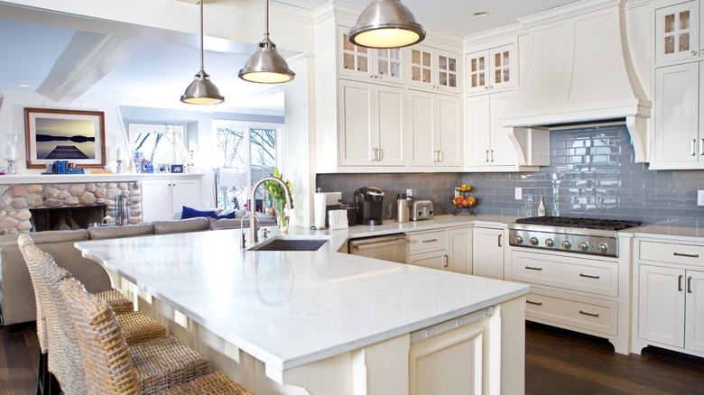 french inspired kitchen with white cabinets