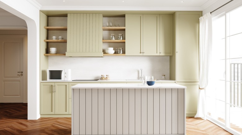 off-white kitchen with paneled island
