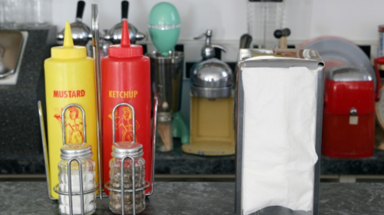condiment bottles and napkin holder from retro diner
