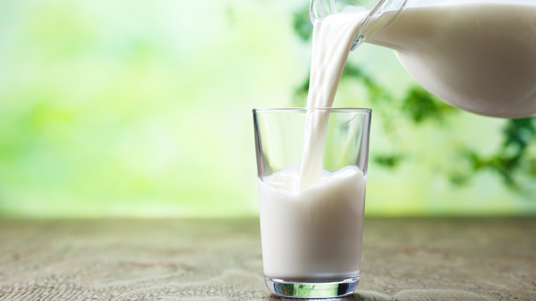 Milk being poured into a glass