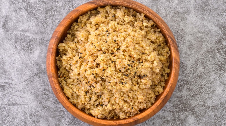 wooden bowl of cooked quinoa