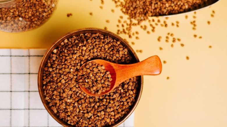 buckwheat groats with a wooden spoon