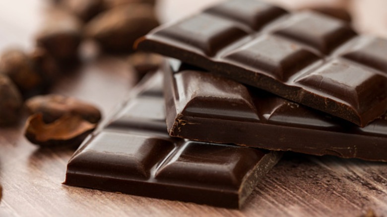 squares of dark chocolate in pile