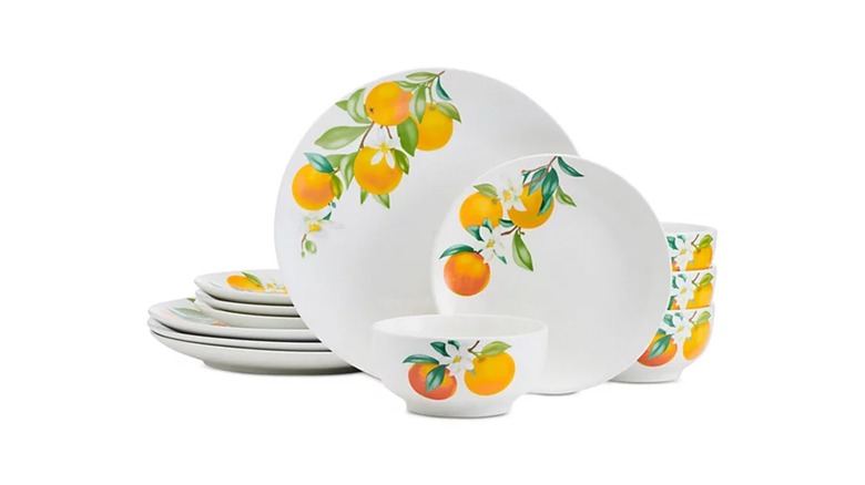 white dishes with orange motif