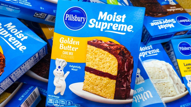 Pillsbury Golden Butter Moist Supreme Cake Mix Box Stacked In Colorful Pile With Assorted Flavor Varieties For Home Baking