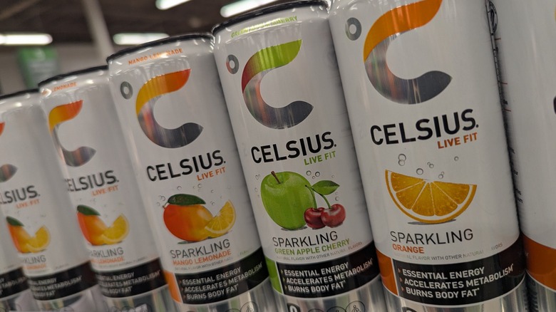 shelf of celsius energy drinks at store