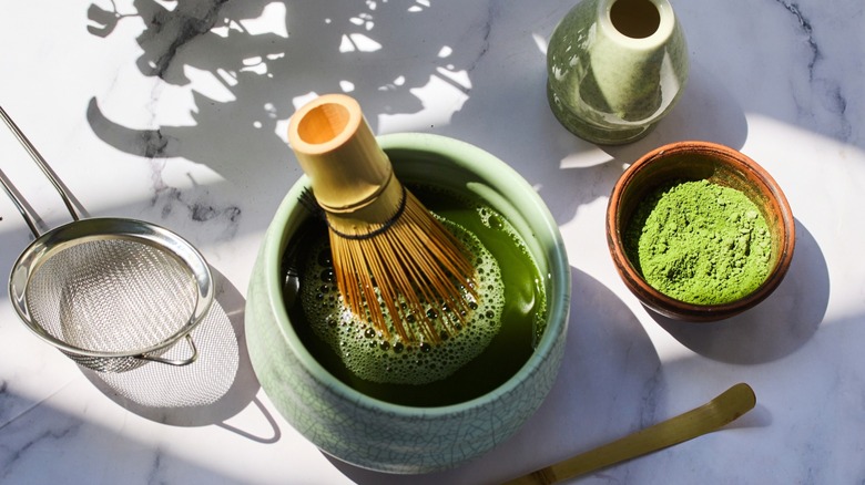 traditional matcha with whisk and strainer
