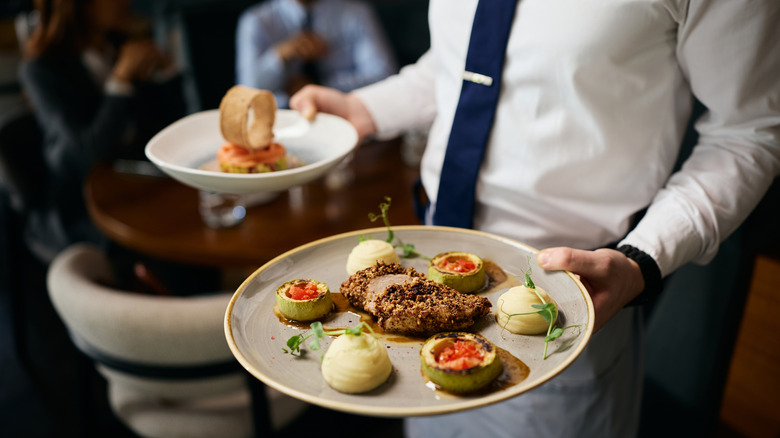 Fine dining server with two plates