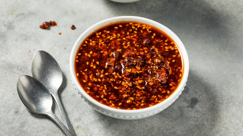 chili crisp in bowl with spoons