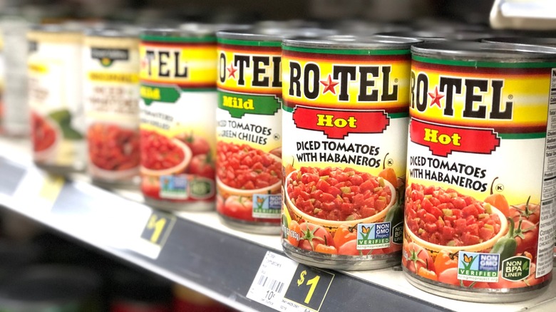 cans of rotel on supermarket shelf