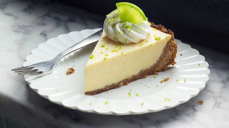 slice of key lime pie with whipped cream