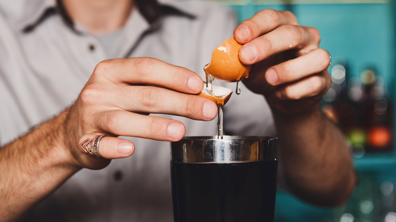 Pouring raw egg into bottle