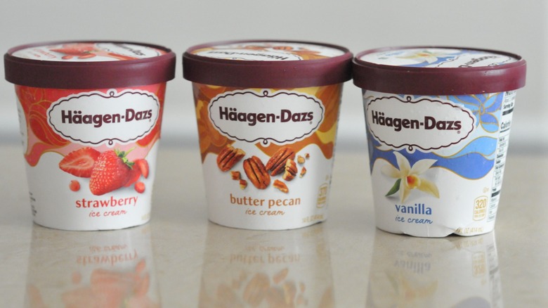 containers of Häagen-Dazs ice cream on a flat surface