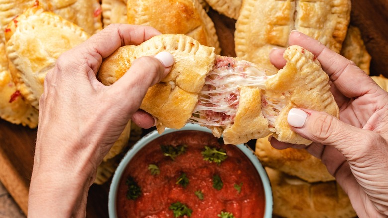 homemade pizza rolls with crescent dough and sauce