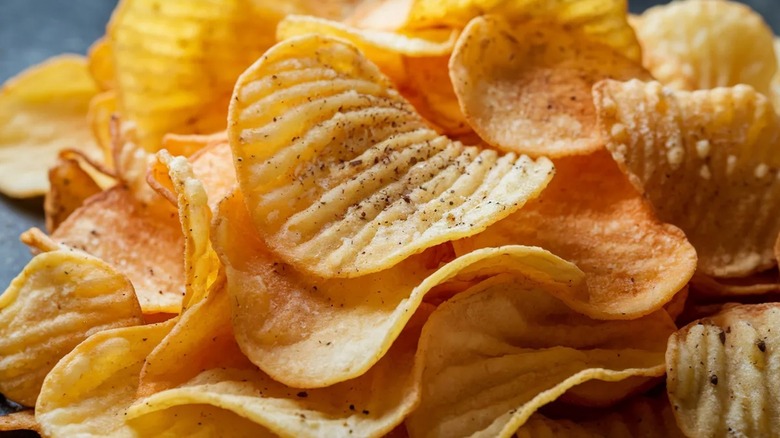 thick potato chips dusted with seasoning