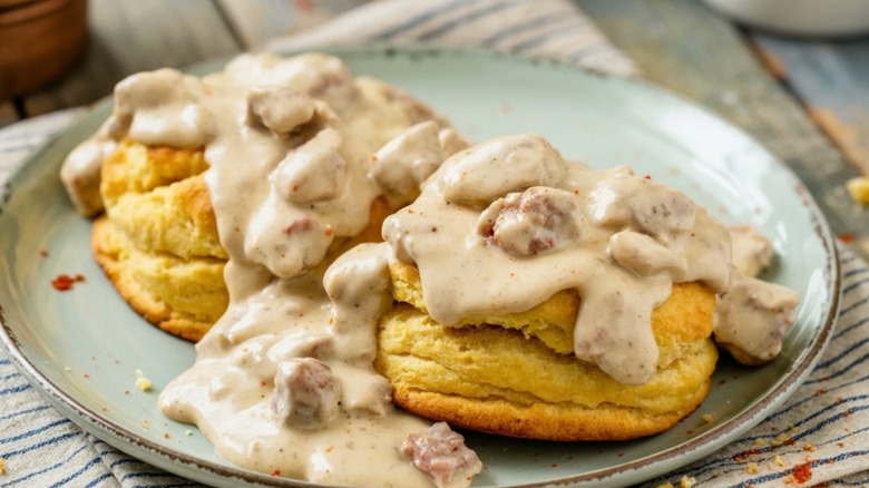 plate of hearty sausage gravy with biscuits