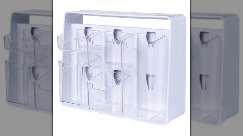 white caddy for holding beverage accessories