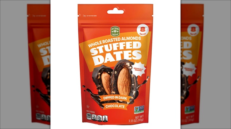 orange bag of stuffed dates with almonds